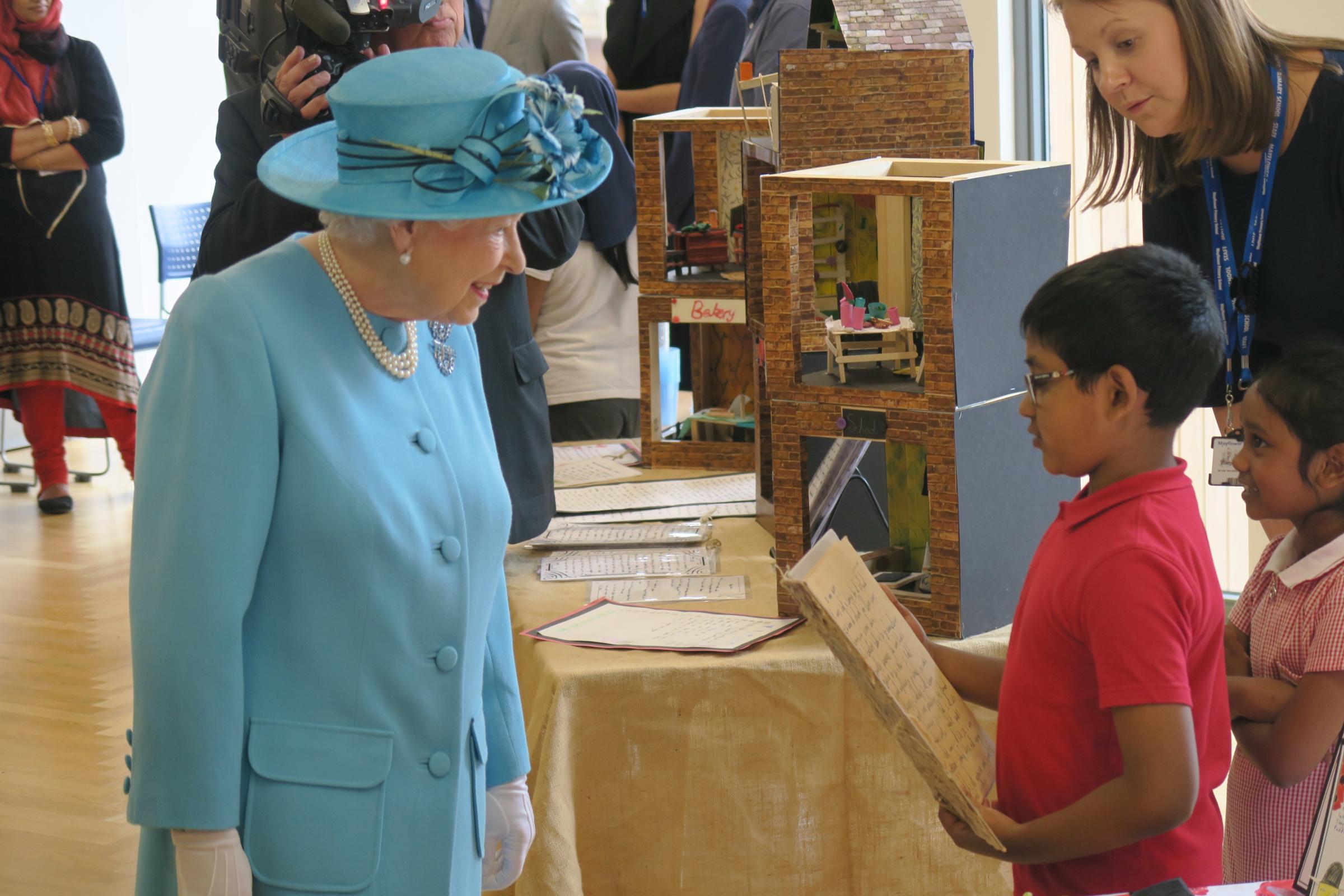 Late Queen meeting pupils in visit arranged by Stan Kaye